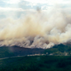 In this photo taken on July 18, 2018, smoke billows from a fire outside Ljusdal, Sweden.